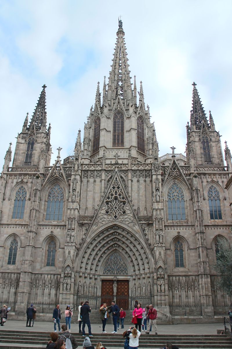The neo-Gothic main facade and spires of Barcelona Cathedral in the Gothic Quarter