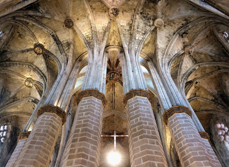 The soaring Catalan Gothic columns and ribbed vaults of the Santa Maria del Mar church interior in El Born, Barcelona
