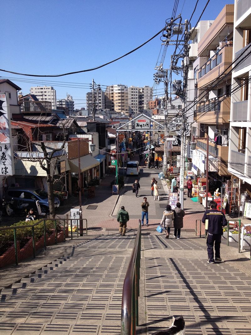 The Yūyake Dandan sunset staircase looking down over the Yanaka Ginza shopping street in old-town Tokyo